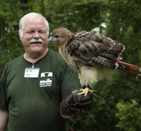 man holding bird